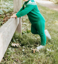 Maddie & Connor Co. Kid's Lucky Clover Romper in green - kids' item - detail view