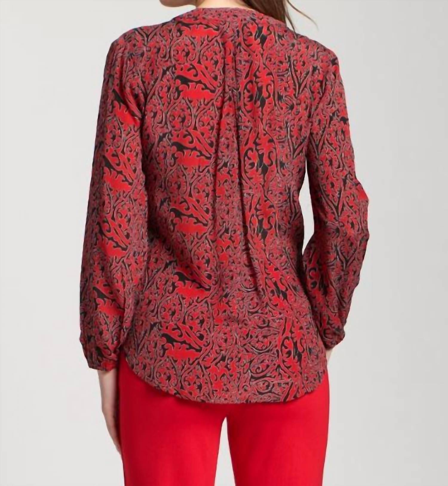 Apny - Crossover Printed Long Sleeve Blouse