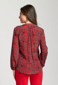 Apny - Crossover Printed Long Sleeve Blouse
