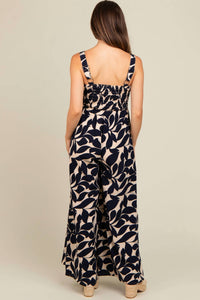 Doe and Rae Floral Flattering Smocked Bodice Jumpsuit in navy - women's pants - detail view