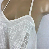 Kiwi Tucker - Peplum Sleeveless Top