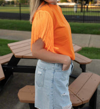 Strut & Bolt Pride of the Southland Fringe Top in orange - women's blouse - detail view