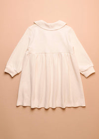Zhoe & Tobiah Girl's Pearl Buttoned Dress in pannacotta - kids' dress - detail view