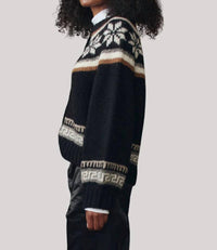THE GREAT. The Snowflake Ice Rink Cardigan in black - women's cardigan - detail view