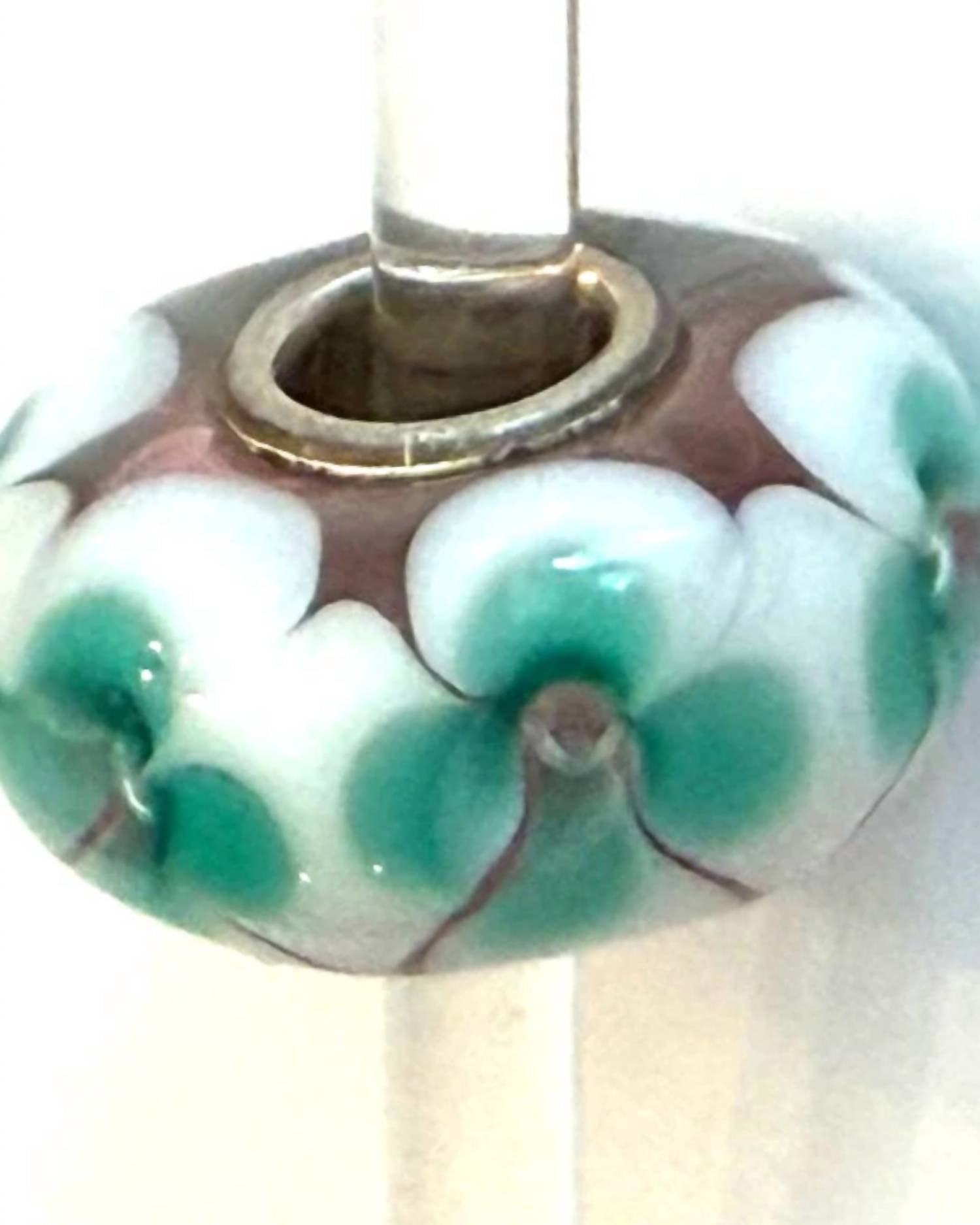 Trollbeads Women's Universal Charm Bead in unique light pink white with aqua flowers - women's item - detail view