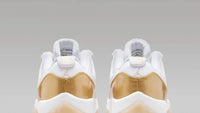 NIKE Women's Retro 11 Low Mother's Day Sneaker in white gold - women's sneaker - alternate view