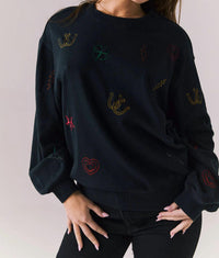 Chaser Allover Icons Pullover in black - women's top