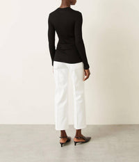 Jil Sander High Rise Flared Jeans in porcelain - women's jeans - detail view
