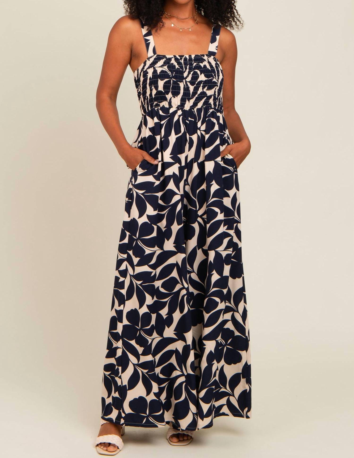 Doe and Rae Floral Flattering Smocked Bodice Jumpsuit in navy - women's pants