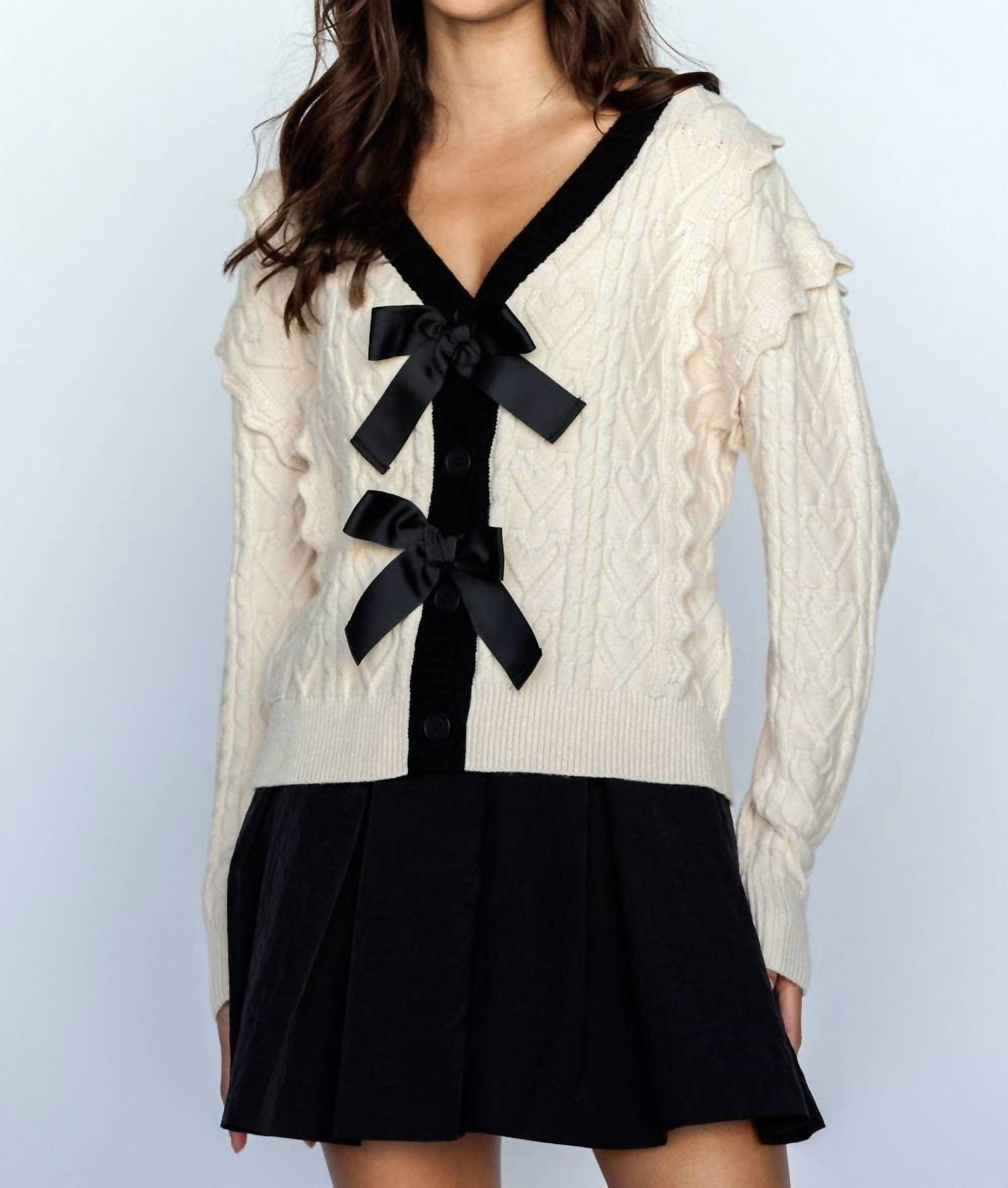 Storia - CABLE KNIT CARDIGAN WITH BOWS