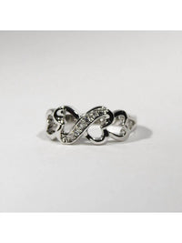 FAIRE Rhodium Plated CZ Four Mini Heart Ring in silver - women's jewelry