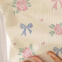 Judson & Company Women's Coquette Roses & Bows Corduroy Cosmetic Bag in pink multi - women's bag - detail view