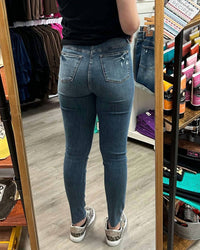 Judy Blue Tommy Vintage Wash Hem Destroy Skinny Jeans in medium wash - women's jeans - detail view
