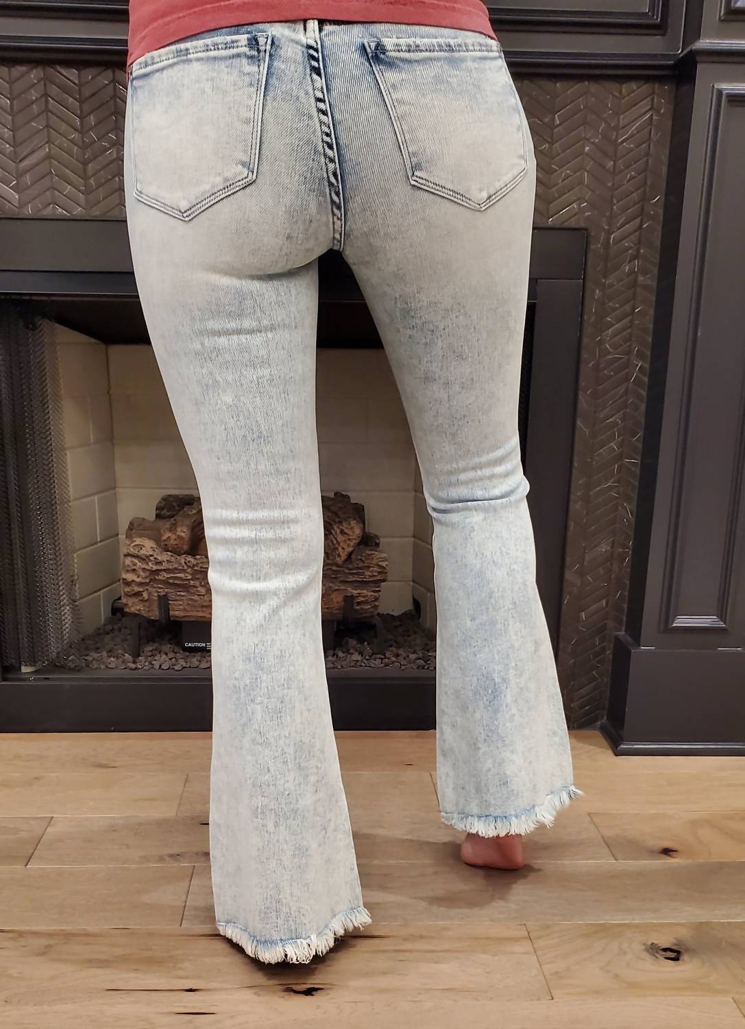 Petra153 Distressed Mid Rise Stretch Flare Jeans in light wash - women's jeans - detail view
