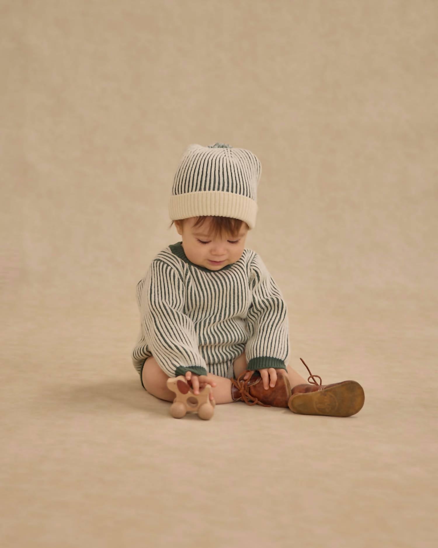 Rylee + Cru Boy's Haywood Romper in green stripe - kids' item