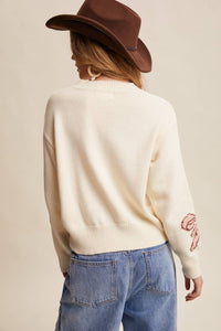 Listicle - Horseshoe Bow Graphic Sweater