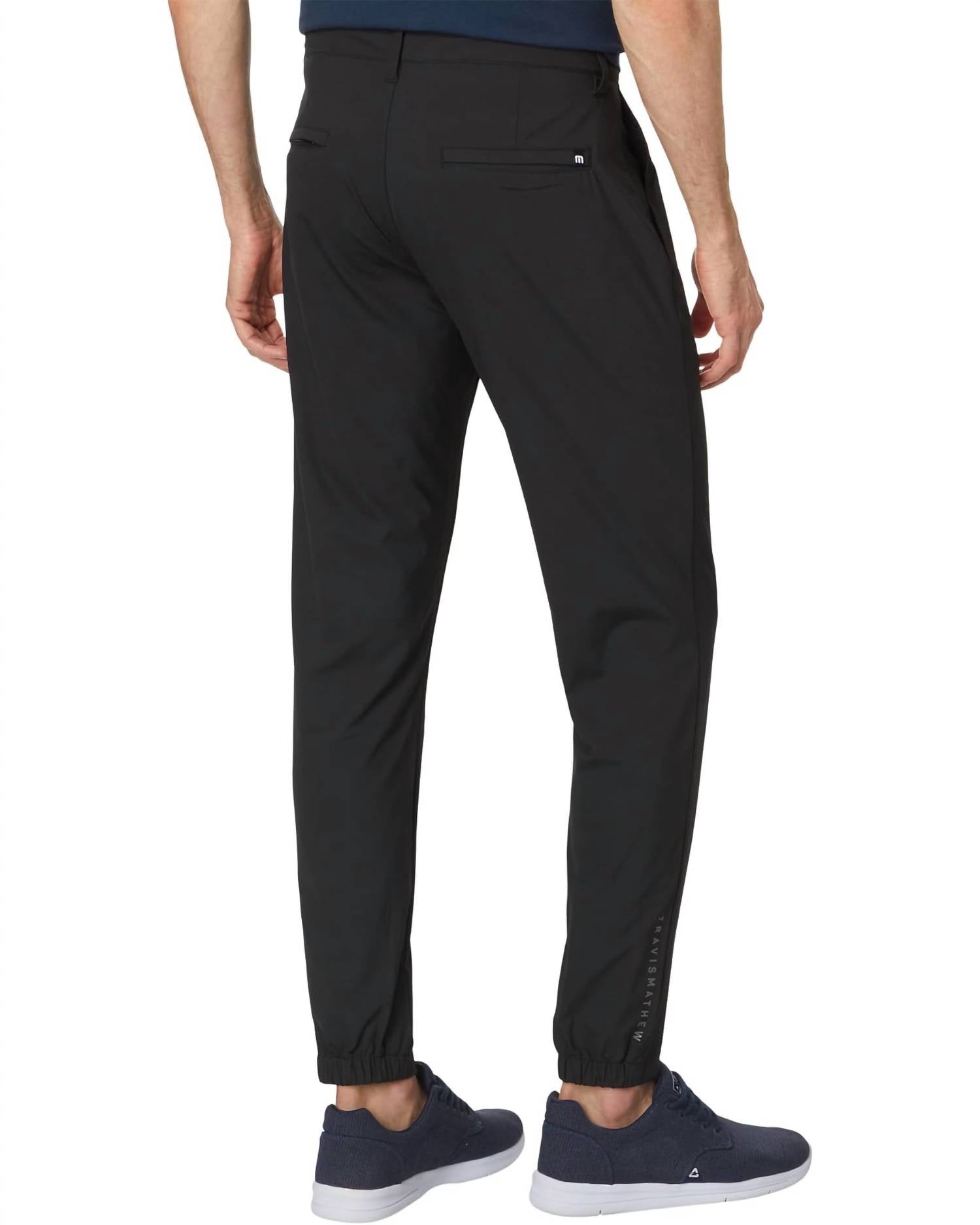 TravisMathew Open To Close Joggers in black - men's pants - detail view