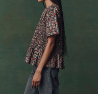 THE GREAT. Smocked Flounce Top in garland print - women's blouse - alternate view