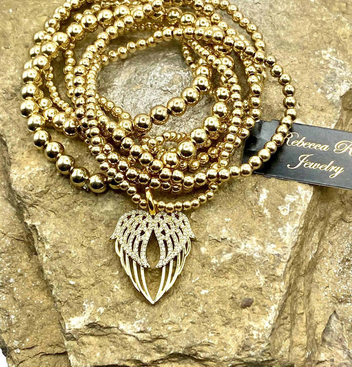 Rebecca Ray Jewelry - Women's Angel Wing Stack Set Of 7 Bracelet