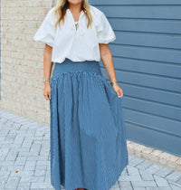 Elan - Curved Maxi Skirt
