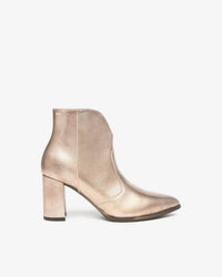 NeroGiardini Women's Metallic Western Ankle Boot in gold - women's shoe