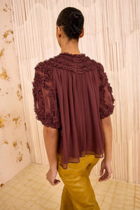 Ulla Johnson Isolda Silk Smocked Short Sleeve Blouse in mahogany 1 - women's blouse - detail view