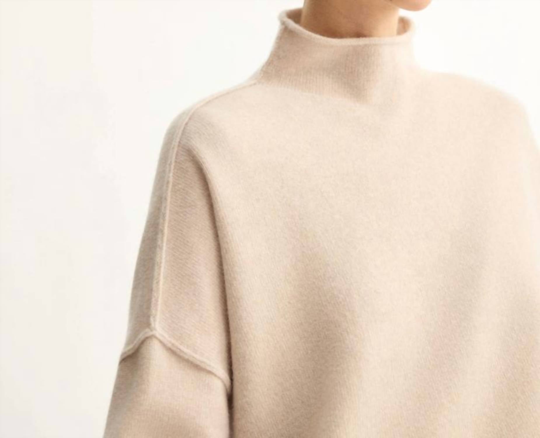 Arlo Mott Penn Roll Neck Top in beige - women's long sleeve top - detail view