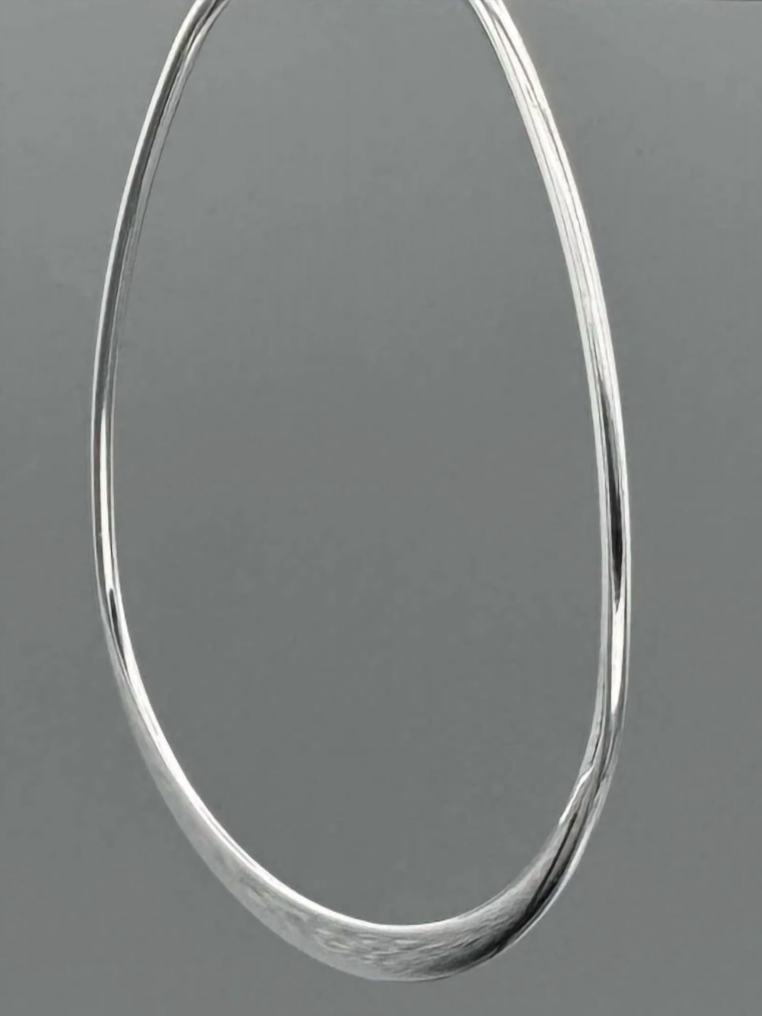 Something Silver - Women's Large Graduated Teardrop Hoops Earrings