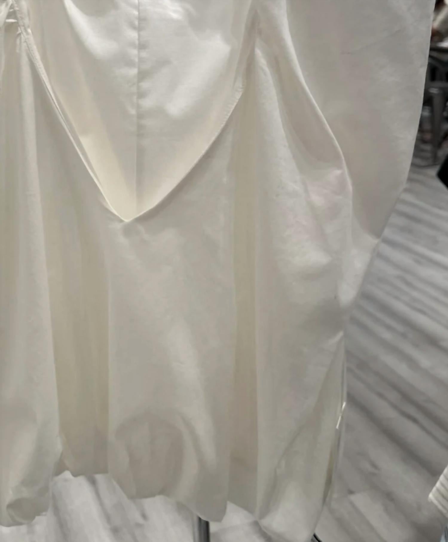 Kld. Signature - Women's Vneck Flowy Bubble Hemmed Top