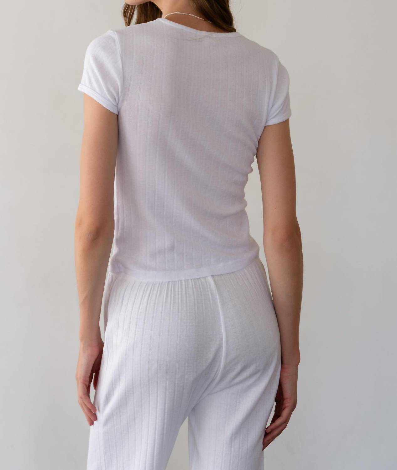DONNI. Pointelle Baby Tee in powder 1 - women's t-shirt - detail view