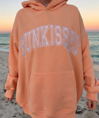 Sunkissed Coconut Junior's Varsity Embroidered Hoodie in sherbert orange - women's top