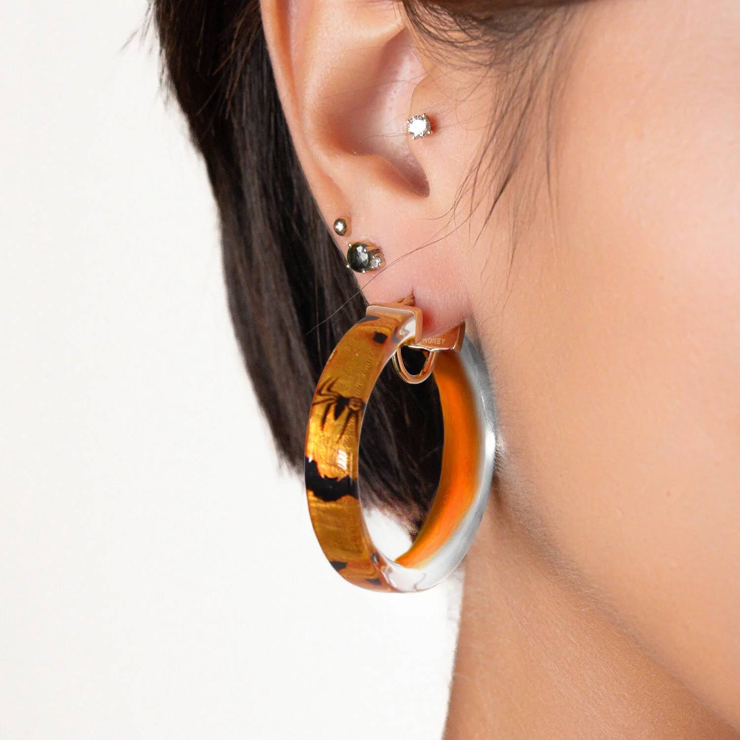 Gold & Honey - Women's Bats And Spiders Illusion Lucite Hoops