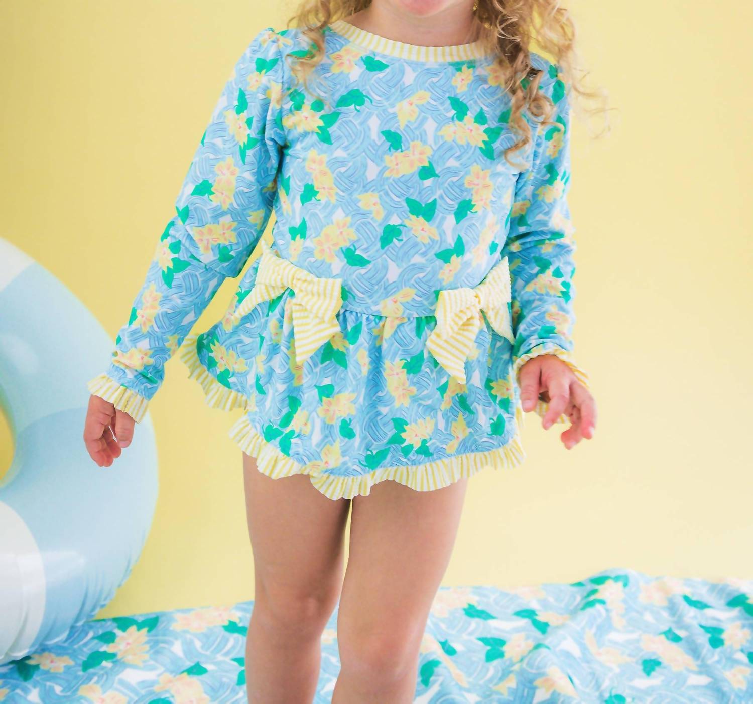Rufflebutts - Long Sleeve One Piece Bow Peplum Rash Guard Swimsuit