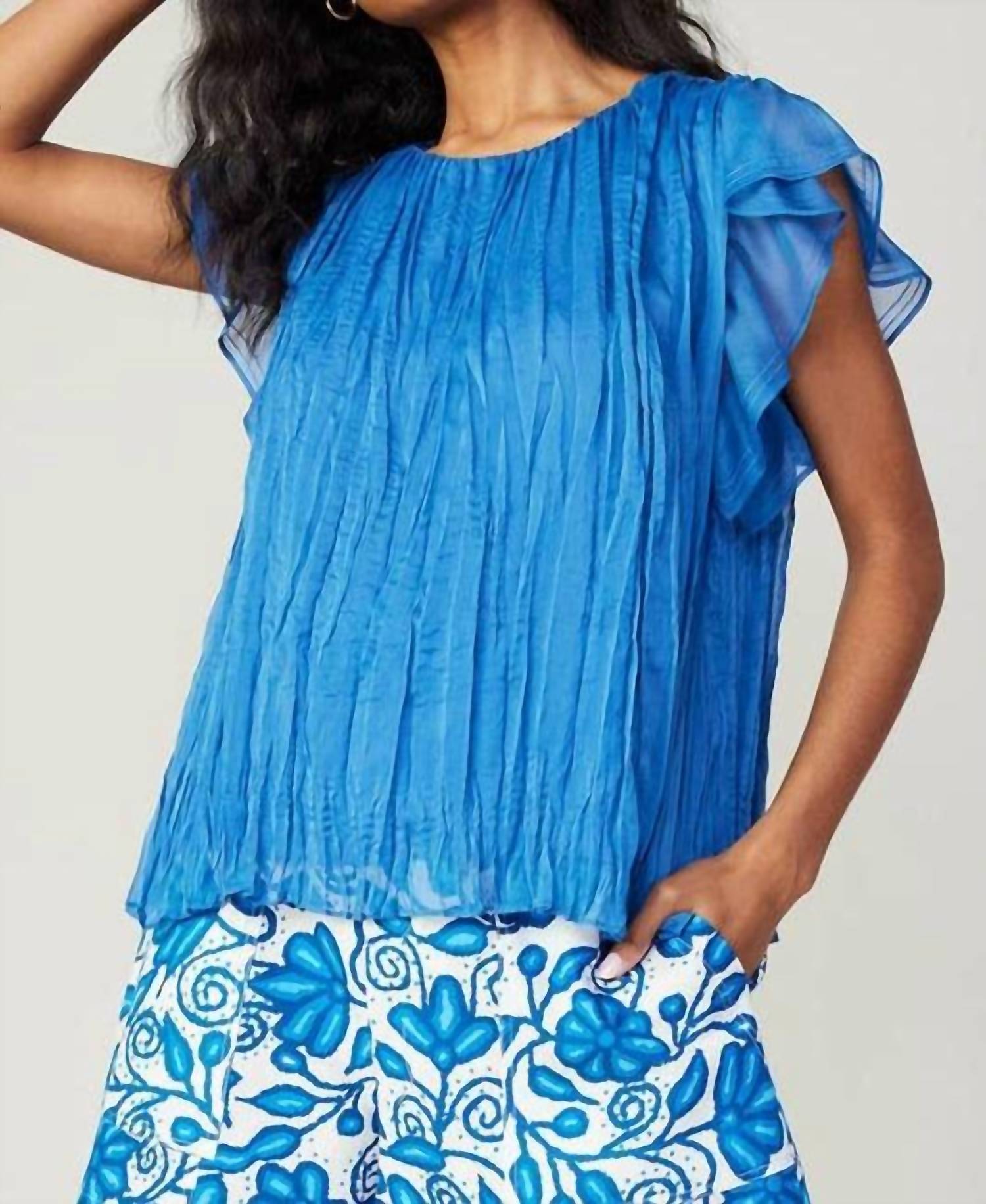current air Flutter Short Ruffle Sleeve Crinkle Top in azure blue - women's blouse - detail view