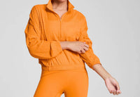 Spanx Get Moving Half Zip Textured Jacket in monarch orange - women's jacket - detail view