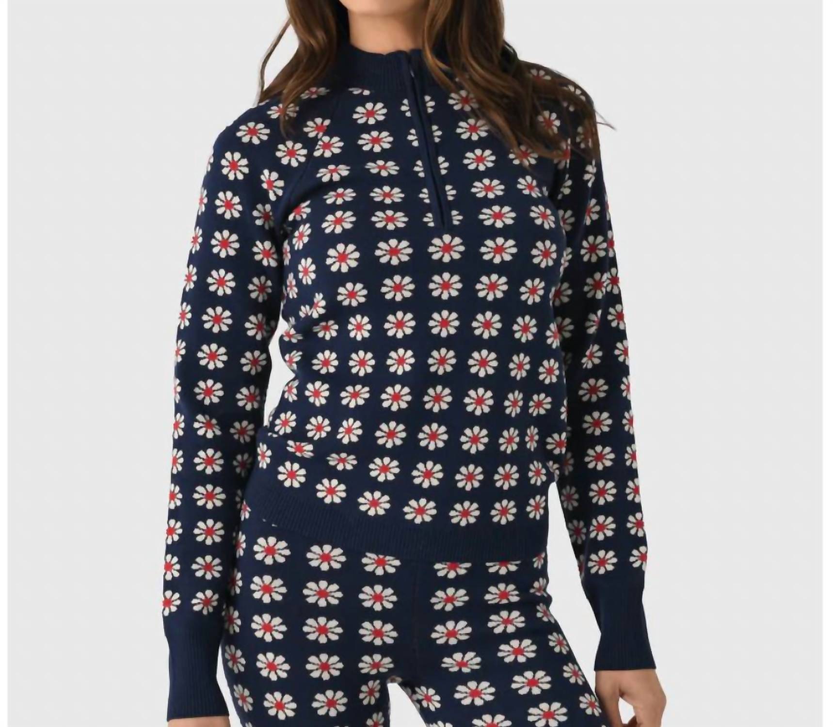 THE GREAT. Merino Quarter Zip Floral Print Top in blue - women's top