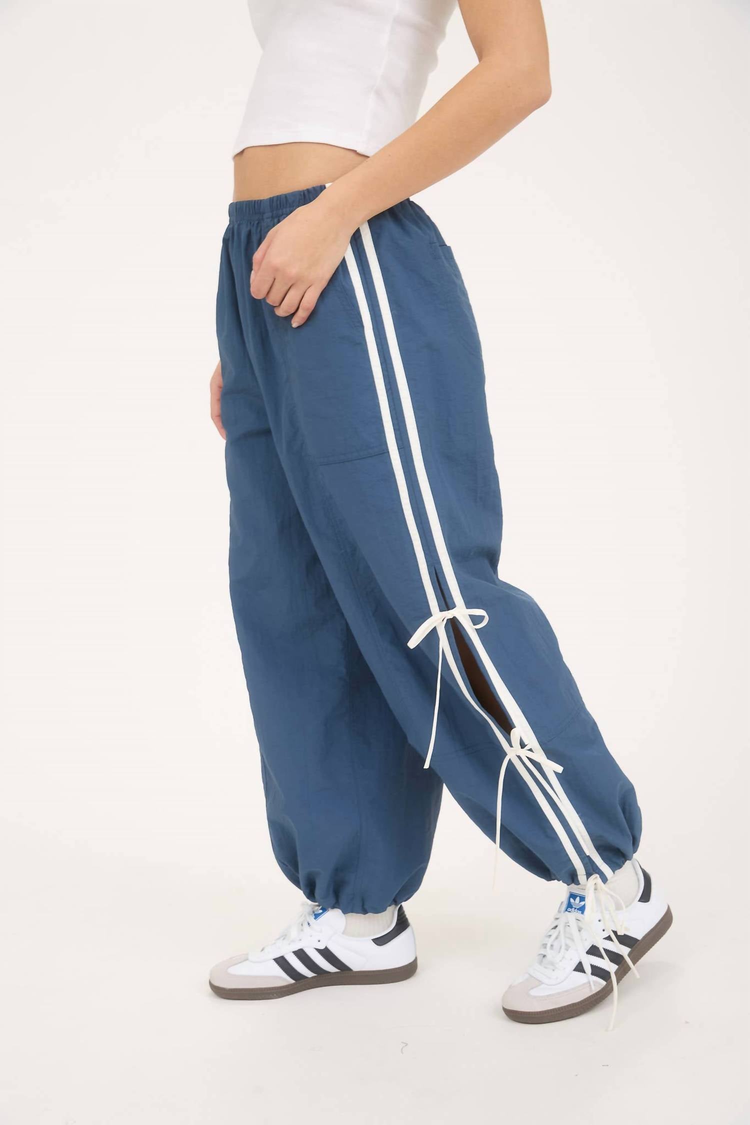 J.O.A. Side Stripe Cut Out Tie Strap Track Joggers in denim - women's pants - detail view
