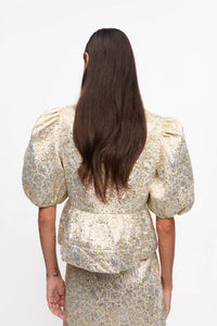 Ganni - Metallic Peplum Tie String Blouse