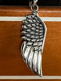 Faire - ANGEL WING STAINLESS PENDANT UNISEX