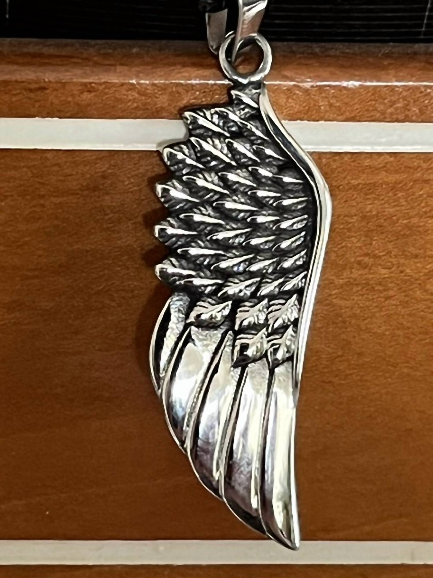 Faire - ANGEL WING STAINLESS PENDANT UNISEX