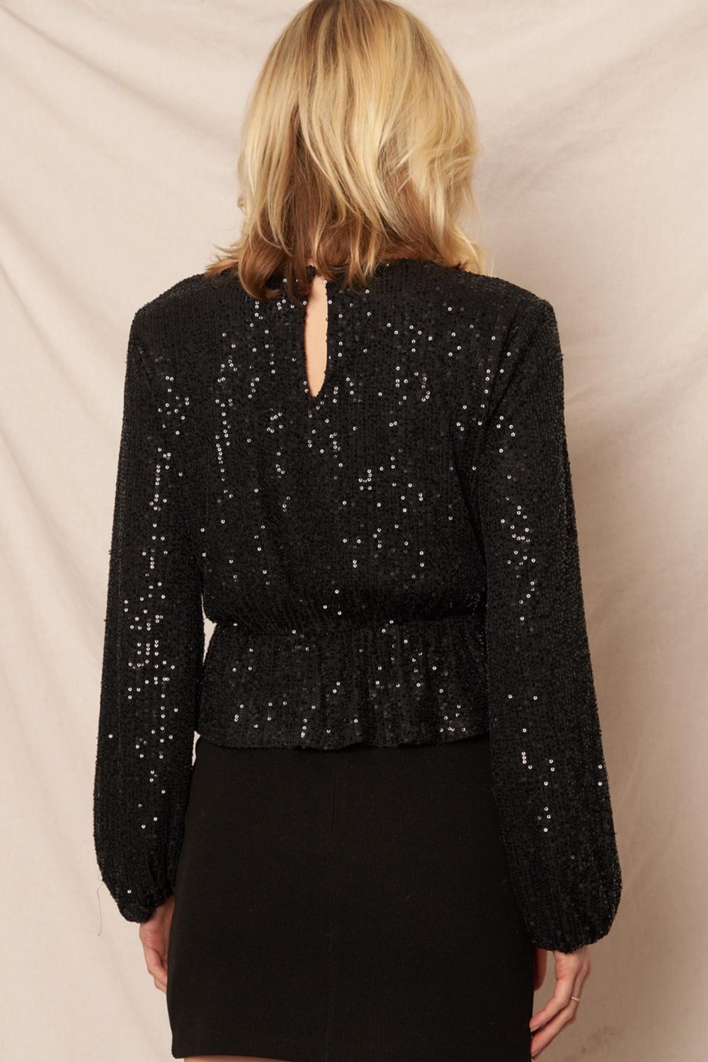 En Creme - Long Sleeve Peplum Sequin Top