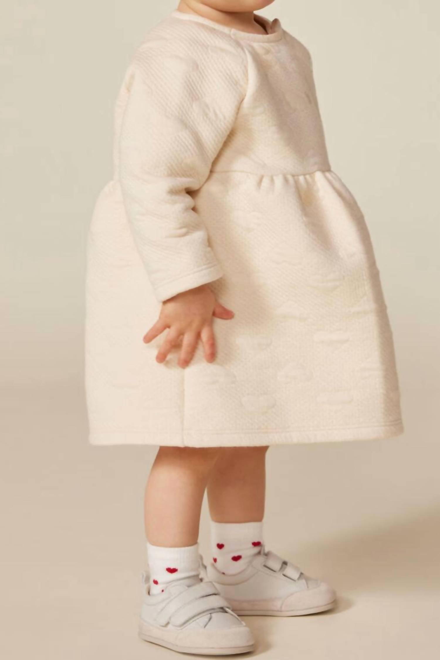 Petit Bateau Embossed Hearts Dress in cream and white - kids' dress - detail view