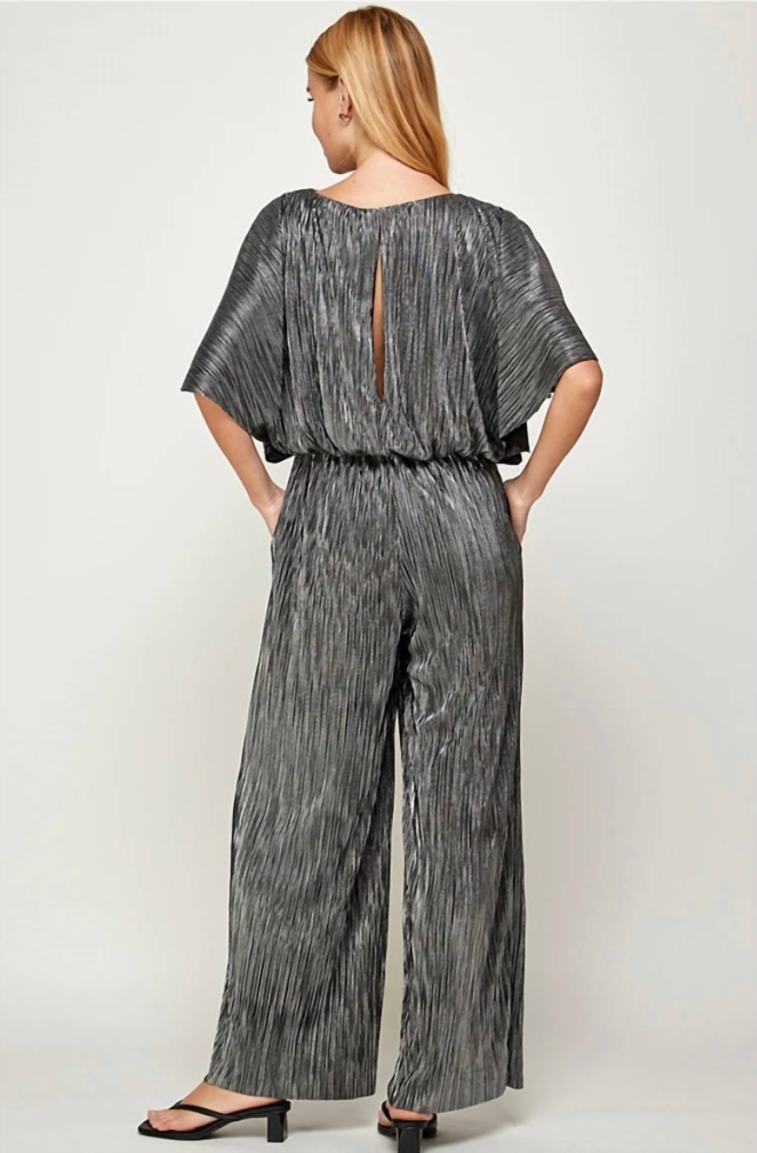 SEE AND BE SEEN Metallic Pleats Jumpsuit in black and silver - women's pants - detail view