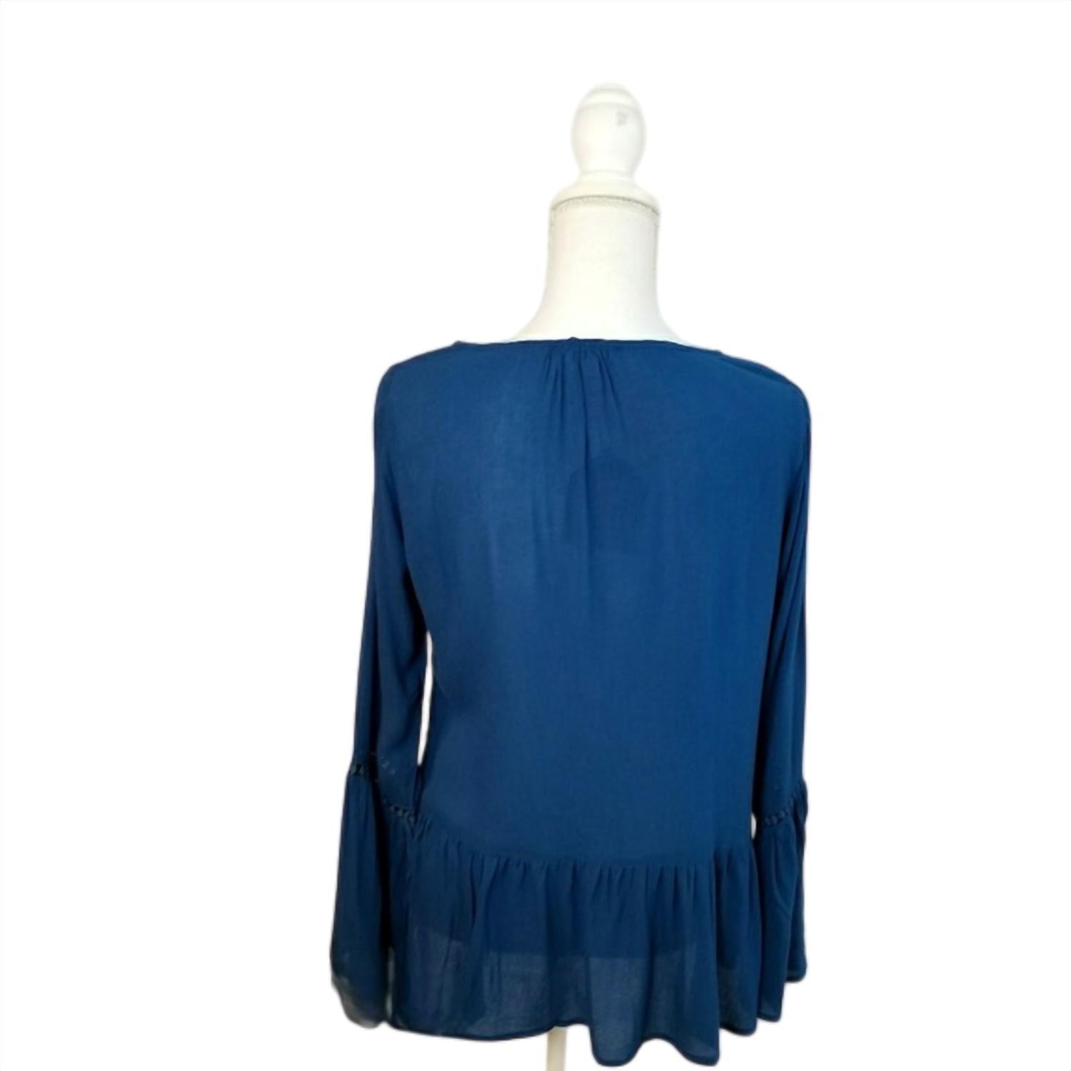 Kori - Long Sleeve Round Neck Top With Ruffled Hem