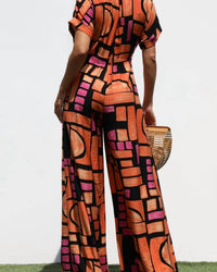 Dress Day Printed Loose Fit Front Zip Jumpsuit in orange - women's pants - detail view