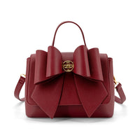 Like Dreams Women's Linda Double Bow Crossbody Bag in red - women's bag