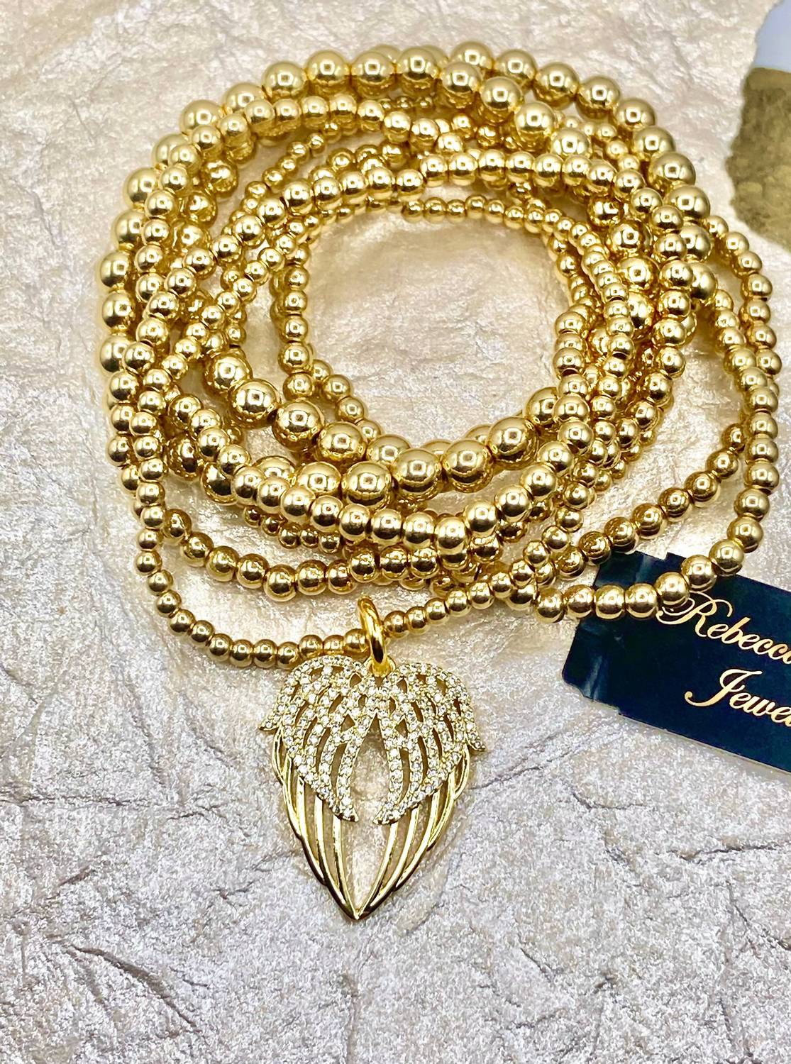 Rebecca Ray Jewelry - Women's Angel Wing Stack Set Of 7 Bracelet