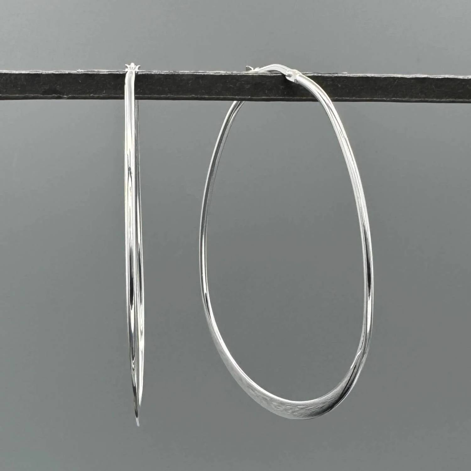 Something Silver - Women's Large Graduated Teardrop Hoops Earrings