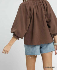umgee Split V-neck Top With Balloon Sleeves in brown - women's blouse - detail view