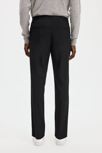 Filippa K Theo Relaxed-fit Wool Trousers in black - men's pants - detail view